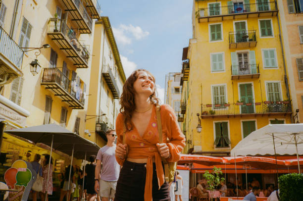 Woman walking in Nice  old town on her vacation