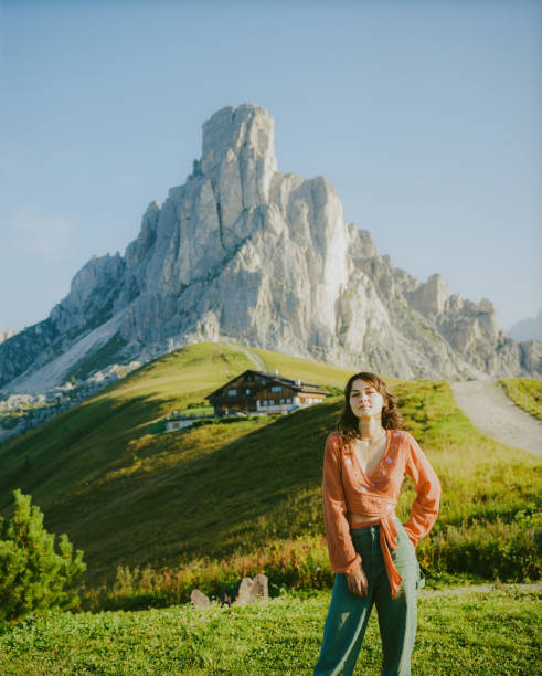 istock Woman walking in Dolomites mountain during summer vacation 1789723845
