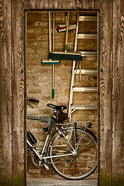 istock Retro styled image of a shed with bicycle and tools 178972492