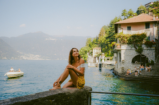 Portrait of woman enjoying vacation on Como Lake in Italy
