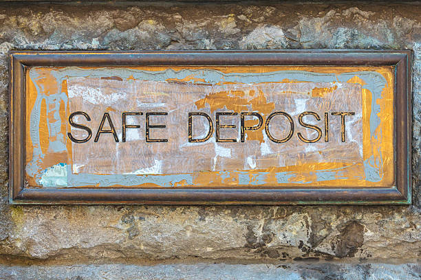 istock Weathered copper bank placard with the text safe deposit 178972724