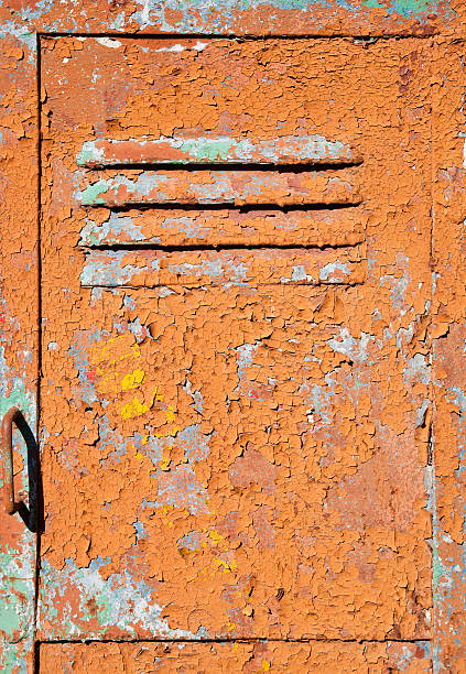 istock Old metal door texture with bright cracked painting 178973136