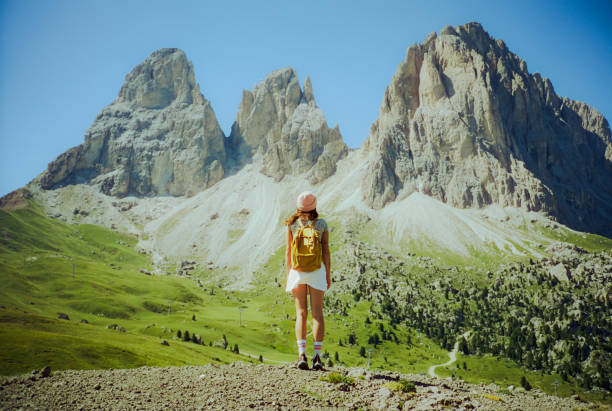 istock Woman hiking in Dolomites mountain during summer vacation 1789732440