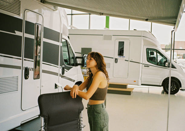 Woman in a motorhome showroom 