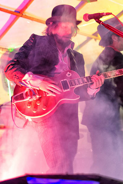 istock Guitarist in a band 178974141