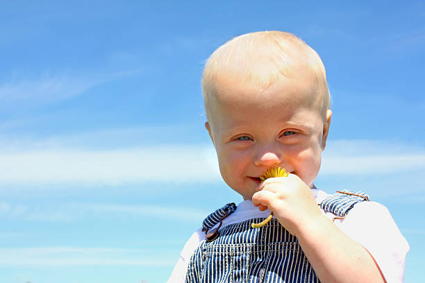 Baby with Dandelion