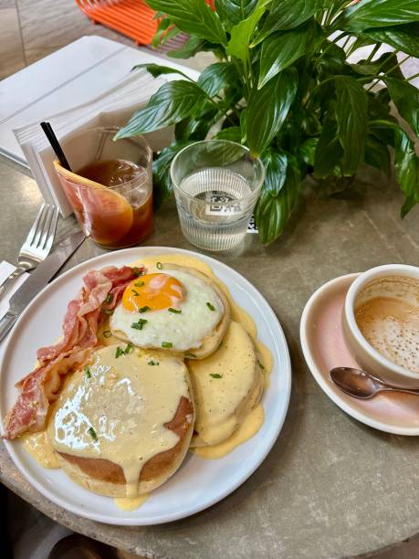 istock breakfast with eggs, bacon and coffee in a cafe 1789765403