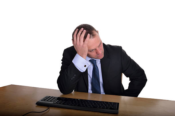 depressed businessman stock photo