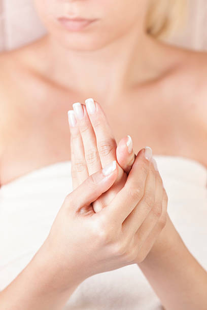 istock female applying cream on her hands 178978520