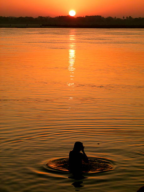 istock Sunrise wash at the river Ganges in India 178978737