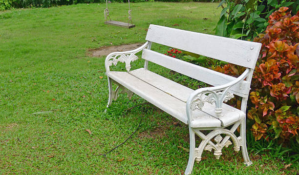 istock White chair in a garden 178978845