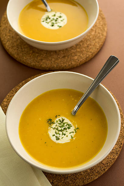 istock Fresh pumpkin soup with cream garnish 178978897