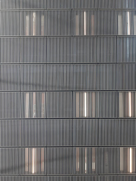 istock Gray metallic background. Metal mesh roof. Energy efficiency and architecture 1789807772