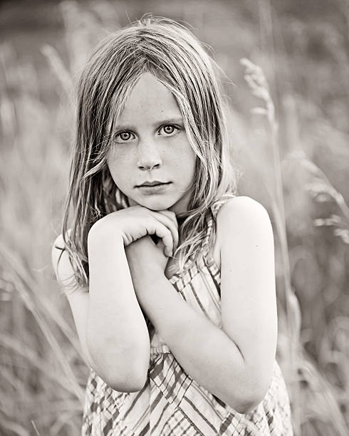 istock Serious Little Girl In Field 178980864