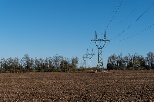 Electricity pylons in the field