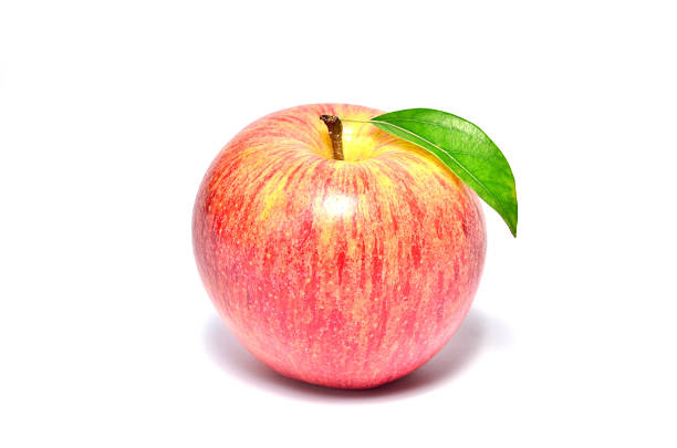 istock ripe red apple with green leaf isolated on white 178982072