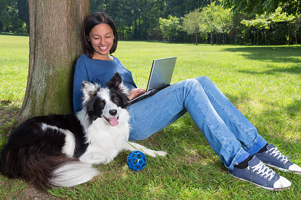 istock Dog and working girl 178982374