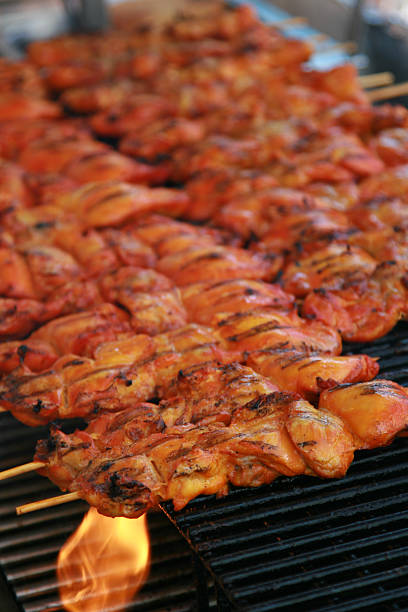 istock Chicken skewers on outdoor grill 178982375