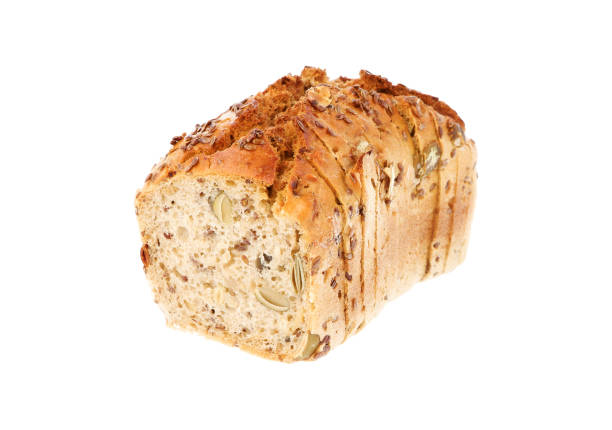 Slices of pumpkin seed bread on a white background. It's crispy. isolated background