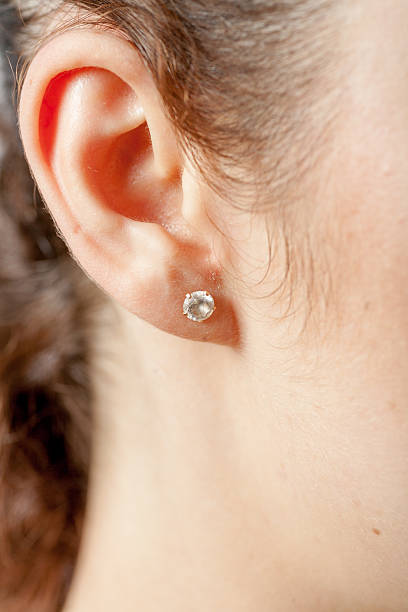 istock Young caucasian woman ear closeup. 178982444