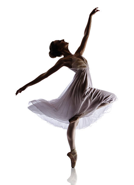 istock Female ballet dancer in motion on tippy toe  178982485