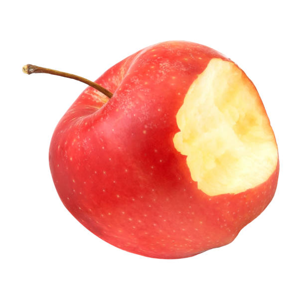 one red ripe bitten apple on a white background. - bite size imagens e fotografias de stock