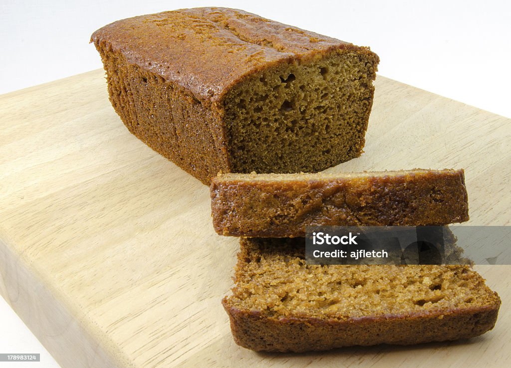 Ginger cake sliced ginger cake on chopping board Baked Stock Photo