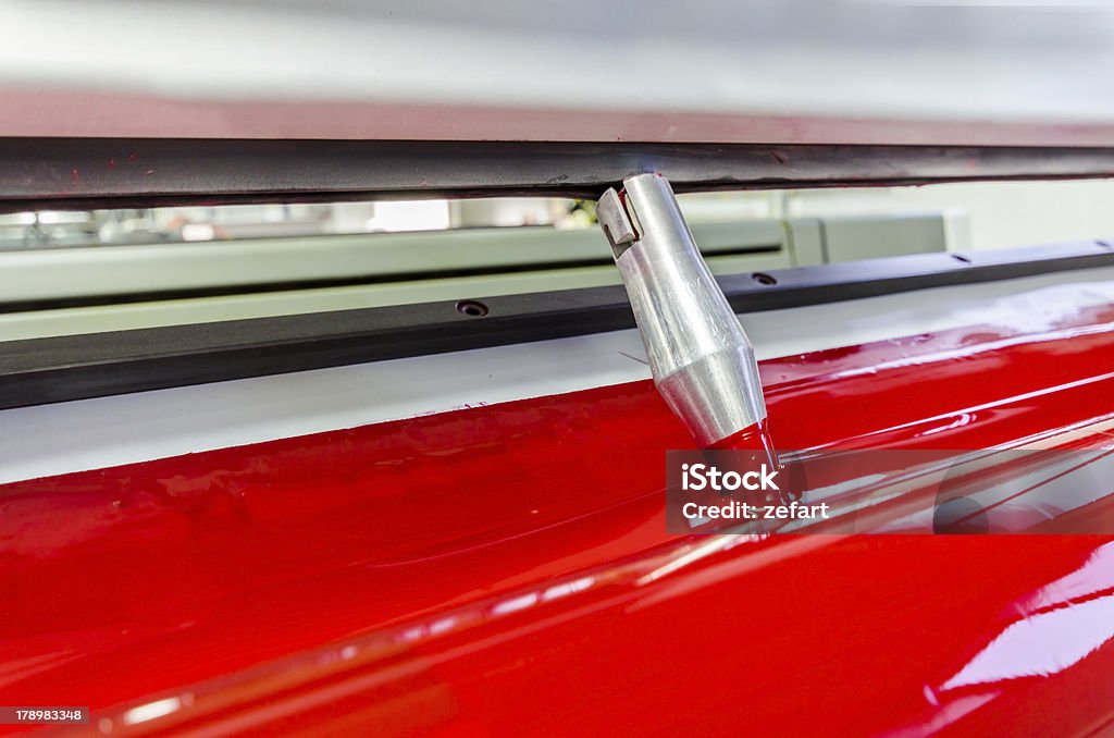 red magenda cor de tinta impressa no compensação máquina roller - Foto de stock de Impressão - Atividade royalty-free