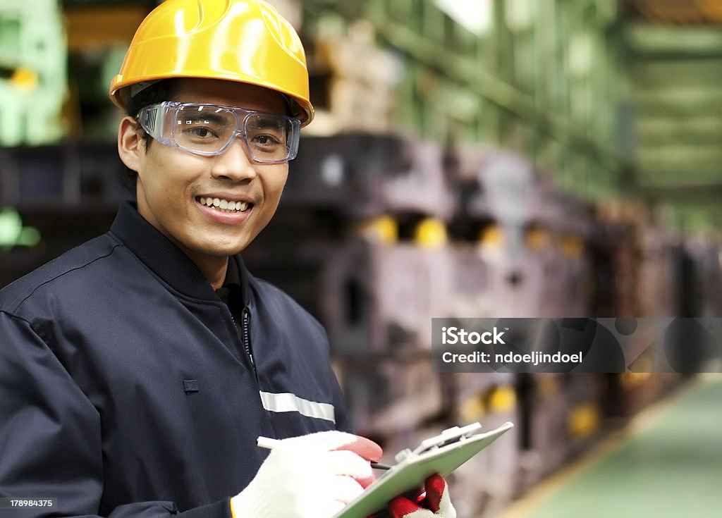 Industrial engineer Portrait asian engineer smiling  look on you camera Inspector Stock Photo