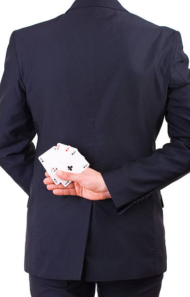 istock Businessman holding playing cards behind his back. 178985865
