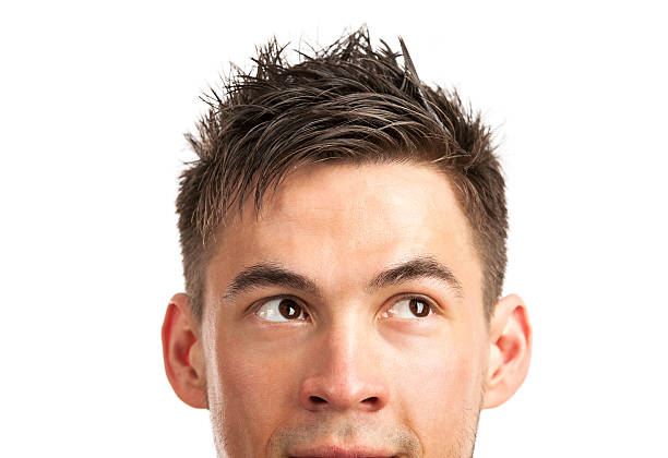 istock Closeup of young man looking at corner 178985914