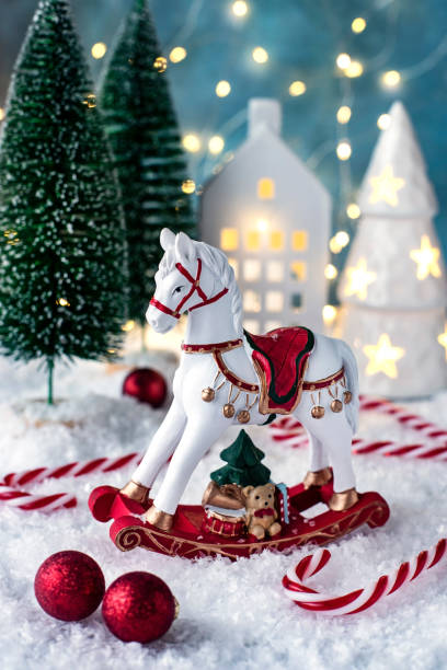 Christmas horse toy with decorations, selective focus