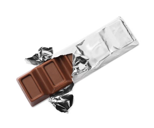 istock Delicious wrapped chocolate bar on white background, top view 1789873621