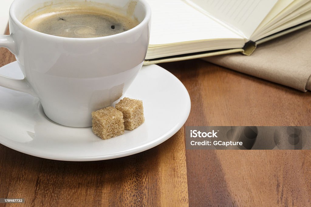 Xícara de espresso com cana-de-açúcar - Foto de stock de Acordar royalty-free