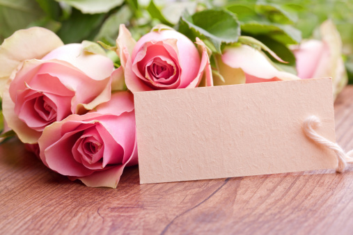 pink roses with gift card