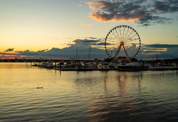 istock Ferris wheel at National Harbor at sunset 1789880520