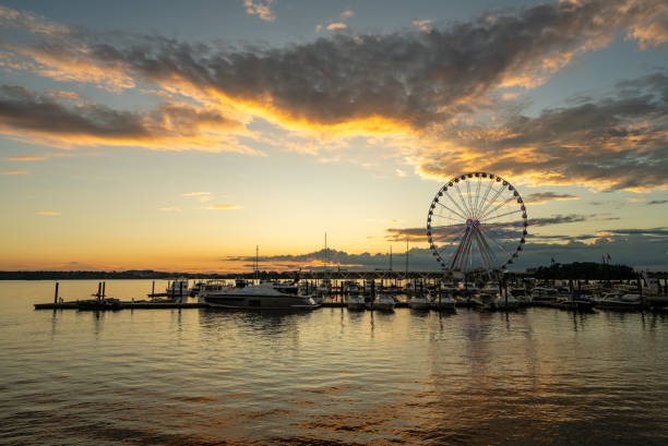 istock Ferris wheel at National Harbor at sunset 1789881559