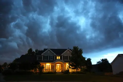 House in bad summer thunderstorm a pic of a haunted house