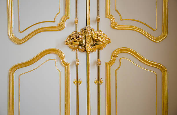 istock Noble castle door with gilded ornaments 178988213