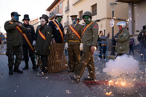 Ibi, Spain - December 28, 2022: Traditional winter festival and masquerade 'Els Enfarinats'. Ibi, Spain. The rebels prepare to capture the mayor
