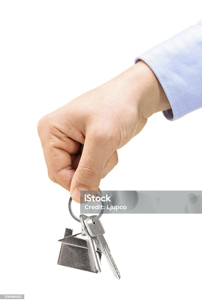 Мужчина Рука держа ключи на кольцо для ключей - Стоковые фото Белый роялти-фри