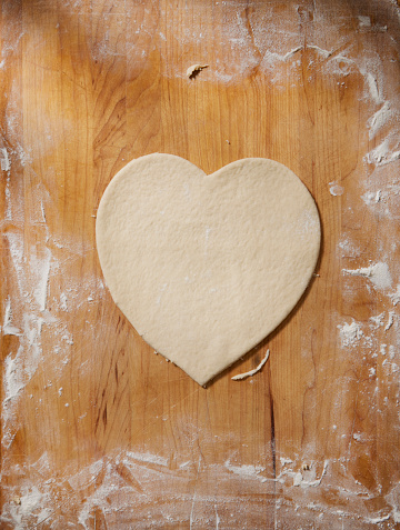 Preparing Heart Shaped Pepperoni Pizza