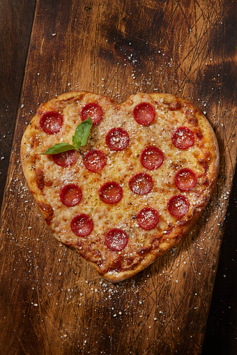 Heart Shaped Pepperoni Pizza with Fresh Basil