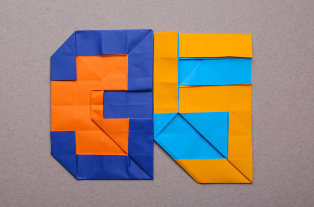istock Number thirty five made of paper on light brown background, top view 1789900246
