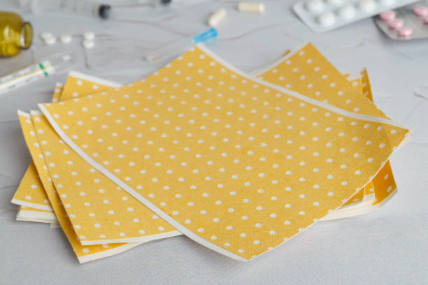 Yellow mustard plaster on light gray table, closeup