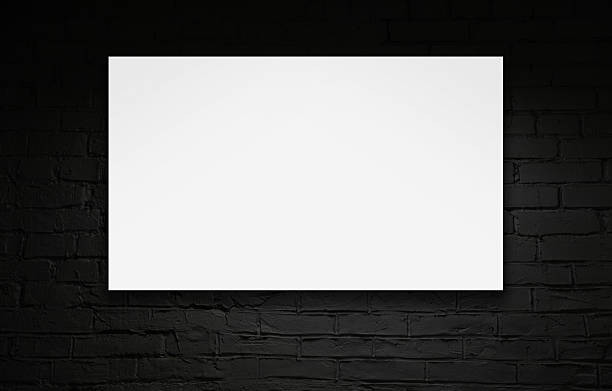 istock Image of blank billboard over black brick wall 178990353