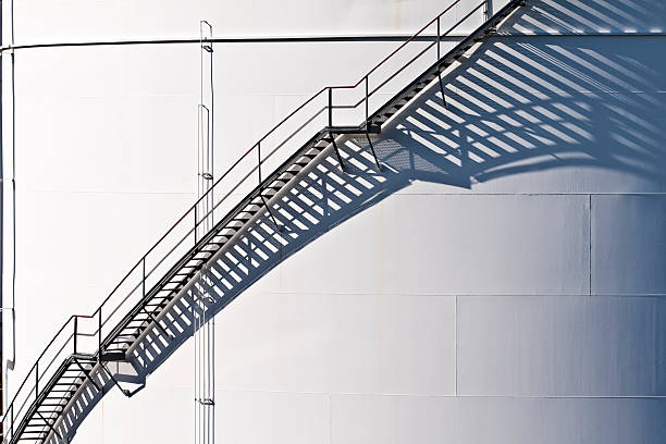 istock white tanks in tank farm with staircase 178991058