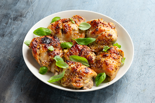 Baked Honey mustard chicken thighs with herbs.