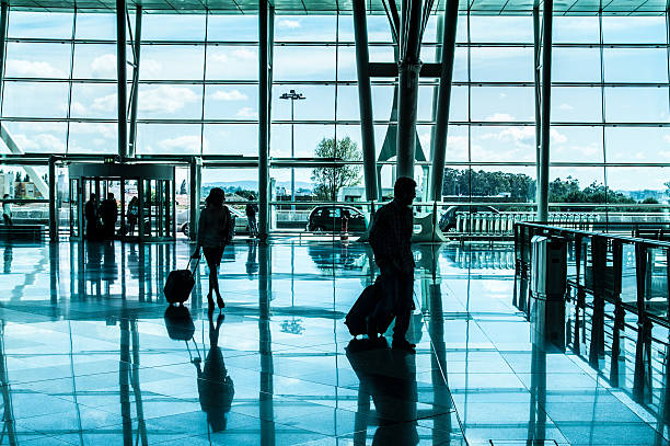 istock people walking in the airport 178992060