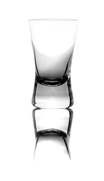 istock Empty glass of vodka isolated on black 178992173